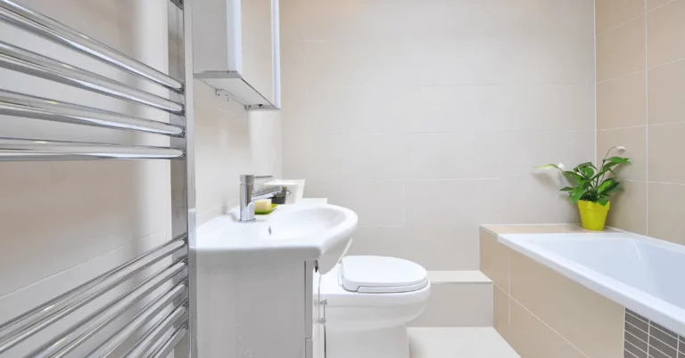 Small, empty white bathroom