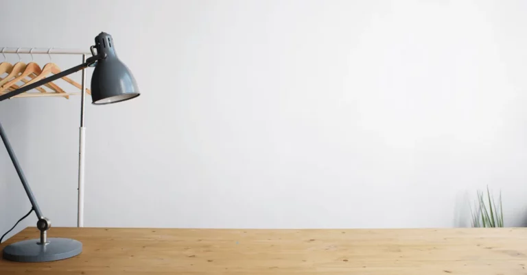 A lamp on an empty desk