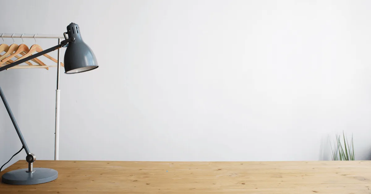A lamp on an empty desk