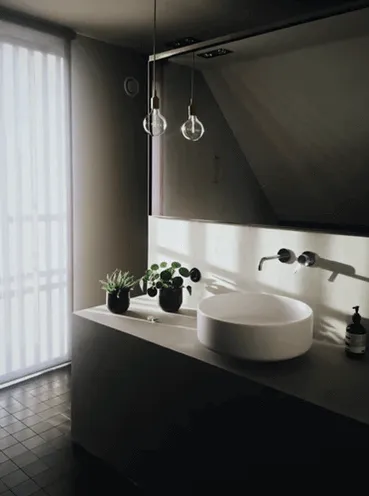 Dark Bathroom With Big Water Tap
