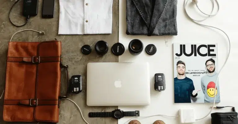 Clothes and digital accessories scattered on the floor