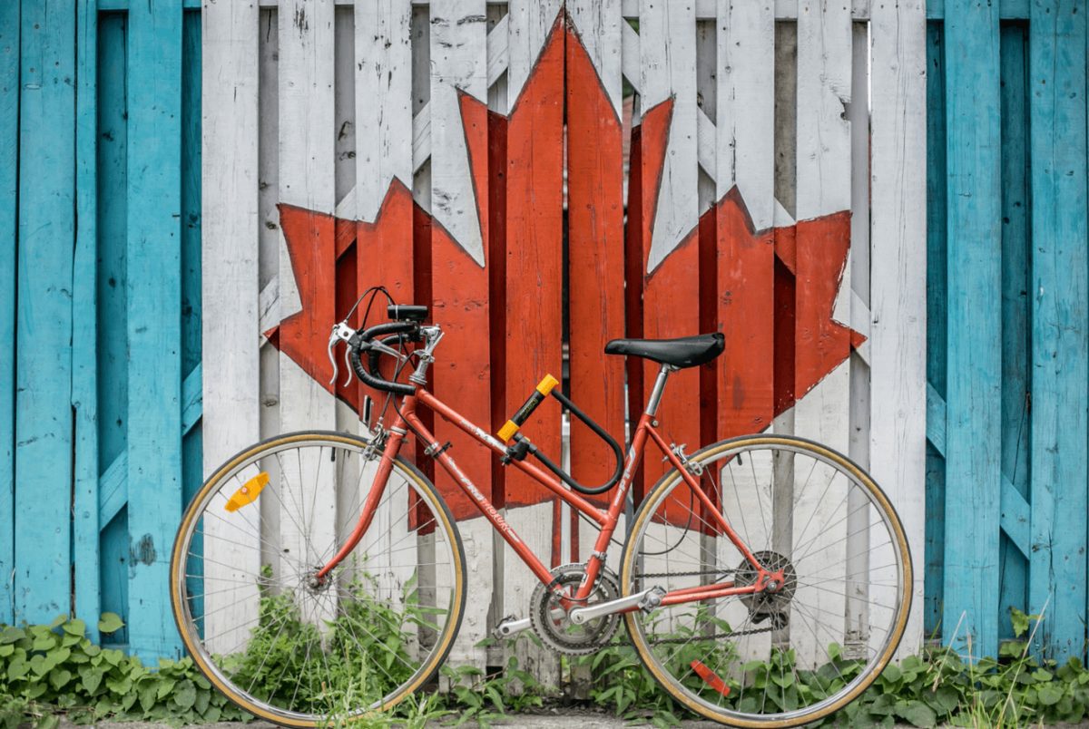 Bike-in-front-of-Canadian-flag-painted-fence