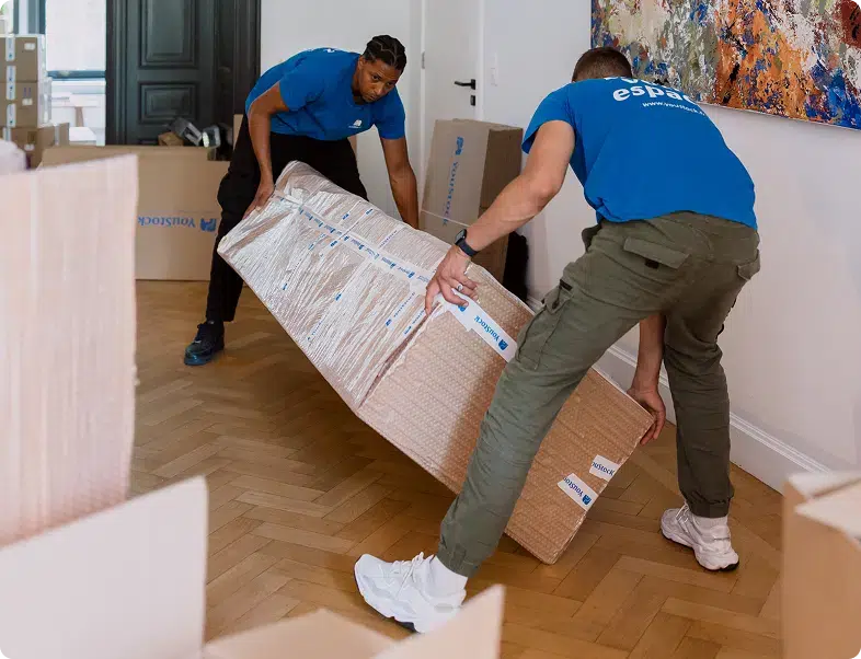 Two YouStock movers move a large moving box