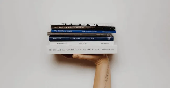 Hand Holding Books