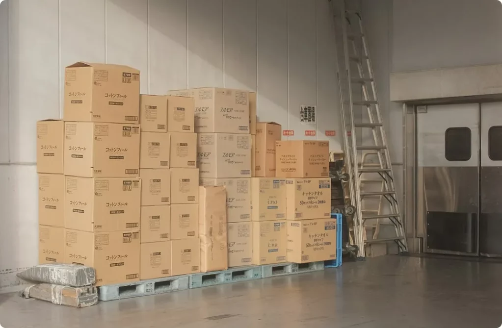 Cardboard boxes stacked on pallets and stored in a warehouse