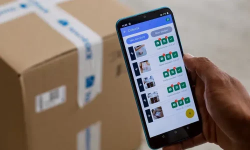Phone screen showing a YouStock customer's photo inventory in front of a wrapped box